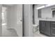 This bathroom offers sleek fixtures, dark cabinets, and modern finishes at 2212 Warm Walnut Dr, Las Vegas, NV 89134