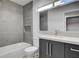 This bathroom features sleek fixtures, dark cabinets, and modern finishes at 2212 Warm Walnut Dr, Las Vegas, NV 89134