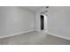 This bedroom offers neutral colors and plush carpeting for a comfortable living space at 2212 Warm Walnut Dr, Las Vegas, NV 89134