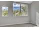 Bedroom with mountain views seen through the windows at 2212 Warm Walnut Dr, Las Vegas, NV 89134