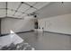 This large garage has an automatic door and a clean, finished floor at 2212 Warm Walnut Dr, Las Vegas, NV 89134