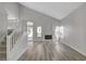 Open living room with a fireplace and a staircase at 2212 Warm Walnut Dr, Las Vegas, NV 89134