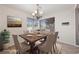 Dining room with stylish table and chairs set on a decorative rug, under a chandelier at 2416 Sun Shores Dr, Las Vegas, NV 89128