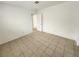 Neutral bedroom featuring tile floors and freshly painted white walls at 2513 Cedar Ave, Las Vegas, NV 89101