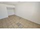 Bedroom features tile floors, closet, and neutral color at 2513 Cedar Ave, Las Vegas, NV 89101