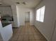 Bright eat-in kitchen with tile flooring and neutral color palette at 2513 Cedar Ave, Las Vegas, NV 89101