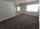 Well-lit living room features fresh paint and neutral carpet at 2513 Cedar Ave, Las Vegas, NV 89101