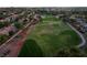 An aerial view of the community featuring an expansive golf course and meticulously maintained landscaping at 2528 Sunup Dr, Las Vegas, NV 89134