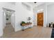 Welcoming foyer with stylish console table and natural light, leading to a spacious home interior at 2528 Sunup Dr, Las Vegas, NV 89134