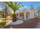 Charming home exterior featuring a custom landscape, unique vegetation, and patio with modern railings at 2528 Sunup Dr, Las Vegas, NV 89134