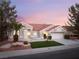 Charming single-story home featuring a well-manicured lawn and desert landscaping at 2528 Sunup Dr, Las Vegas, NV 89134