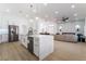 Spacious open concept kitchen with island seating and stainless steel appliances at 2528 Sunup Dr, Las Vegas, NV 89134
