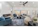 Modern living room featuring a sleek fireplace, recessed lighting, and expansive windows at 2528 Sunup Dr, Las Vegas, NV 89134