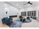 Modern living room features a fireplace, recessed lighting, and stylish furniture at 2528 Sunup Dr, Las Vegas, NV 89134
