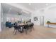 Bright, open-concept living and dining area with modern furniture and plenty of natural light at 2528 Sunup Dr, Las Vegas, NV 89134