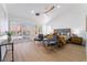 Bright main bedroom with ample natural light, a ceiling fan, neutral decor, and an attached seating area at 2528 Sunup Dr, Las Vegas, NV 89134