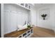 Stylish mudroom with custom built-ins and bench seating creates an organized entry at 2528 Sunup Dr, Las Vegas, NV 89134