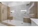 Expansive glass shower highlighting stylish tile work, dual shower heads, and sleek design at 2528 Sunup Dr, Las Vegas, NV 89134