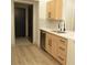 Stainless steel dishwasher and deep sink with white countertops complete the kitchen at 2615 W Gary Ave # 1015, Las Vegas, NV 89123