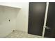 Laundry room featuring stylish tile floor and shelving at 2615 W Gary Ave # 1015, Las Vegas, NV 89123