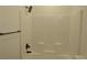 Clean white shower and tub combination with black fixtures and tile surround at 2615 W Gary Ave # 1015, Las Vegas, NV 89123