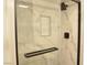 Contemporary shower with marble-look tile, matte black fixtures, and glass enclosure at 2615 W Gary Ave # 1015, Las Vegas, NV 89123