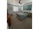 Bedroom with a plush bed, carpeted flooring, a ceiling fan and stylish décor at 3216 Waterstone Ave, Henderson, NV 89044