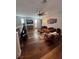 Upstairs living room with hardwood floors, modern furniture, and neutral decor at 3216 Waterstone Ave, Henderson, NV 89044