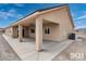 Covered patio with ceiling fan, exterior grade tile, and access to large backyard at 3761 S Tumbleweed Ave, Pahrump, NV 89048