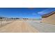 Large backyard offers space for recreation with a view of mountains in the distance at 3761 S Tumbleweed Ave, Pahrump, NV 89048