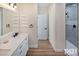 Elegant bathroom with a sleek vanity, modern fixtures, and seamless access to a luxurious walk-in shower at 3761 S Tumbleweed Ave, Pahrump, NV 89048