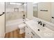 This bathroom features tile accents, a marble vanity, and modern fixtures at 3761 S Tumbleweed Ave, Pahrump, NV 89048