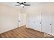 Comfortable bedroom featuring a ceiling fan and a closet with sliding doors at 3761 S Tumbleweed Ave, Pahrump, NV 89048