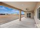 Comfortable back patio offers shade and a view of the landscape, perfect for relaxation at 3761 S Tumbleweed Ave, Pahrump, NV 89048