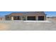 A single-story home has a tile roof, two-car garage, and desert landscaping at 3761 S Tumbleweed Ave, Pahrump, NV 89048
