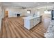 Modern kitchen with a white island and lots of room for entertaining at 3761 S Tumbleweed Ave, Pahrump, NV 89048