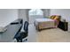 Inviting bedroom suite with ample space, a comfortable bed, desk, and an outside view at 3930 University Center Dr # 409, Las Vegas, NV 89119