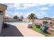 Spacious backyard featuring a refreshing pool, comfortable lounge chairs, and a cozy fire pit area at 4786 San Rafael Ave, Las Vegas, NV 89120