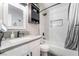 Modern bathroom features updated fixtures, a shower-tub combination, and a stylish vanity with ample lighting at 4786 San Rafael Ave, Las Vegas, NV 89120