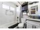 Updated bathroom features a shower-tub combo with modern fixtures and contemporary design elements at 4786 San Rafael Ave, Las Vegas, NV 89120