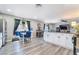 Modern kitchen with stainless steel appliances, white cabinetry, and open layout at 4786 San Rafael Ave, Las Vegas, NV 89120