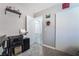 A home office featuring a sliding door closet and desk setup, designed for organization and productivity at 4786 San Rafael Ave, Las Vegas, NV 89120