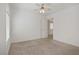 Well lit bedroom with neutral carpet, with natural light from window at 4972 Groveland Ave, Las Vegas, NV 89139