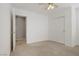 Cozy bedroom with neutral carpet, closet and ceiling fan at 4972 Groveland Ave, Las Vegas, NV 89139