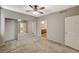 Bedroom showcases a large closet with mirrored doors and an attached bathroom at 50 Aura De Blanco St # 19103, Henderson, NV 89074