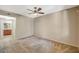 Expansive bedroom includes an attached bathroom with a tiled floor and a double sink vanity at 50 Aura De Blanco St # 19103, Henderson, NV 89074