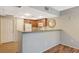 Well-maintained kitchen with ample cabinet space and breakfast bar seating at 50 Aura De Blanco St # 19103, Henderson, NV 89074