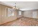 Open-concept living room with natural light, and door for easy access at 50 Aura De Blanco St # 19103, Henderson, NV 89074