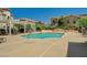 Community pool surrounded by lounge chairs, offering a relaxing outdoor space at 50 Aura De Blanco St # 19103, Henderson, NV 89074