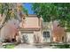 Charming two-story home with a one-car garage and mature trees in a well-maintained neighborhood at 5588 Ness Ave, Las Vegas, NV 89118